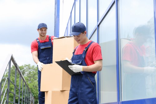 Moving van loading boxes outside a residential property in Ealing
