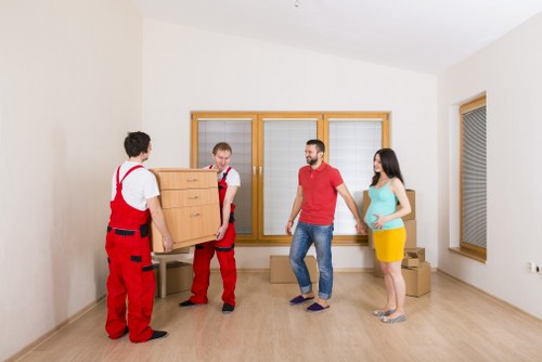 Local movers transporting office furniture for an Ealing business relocation