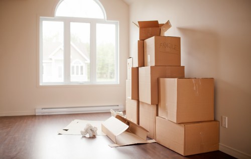 Careful loading of furniture and boxes for a flat removal in Ealing