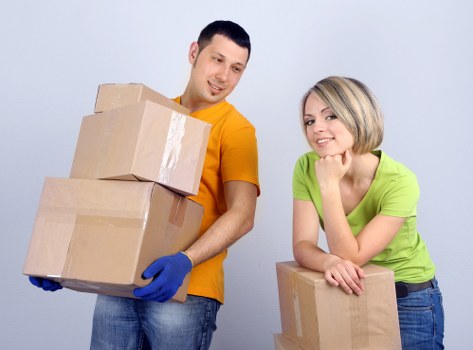Packed boxes and furniture ready for transport in West London