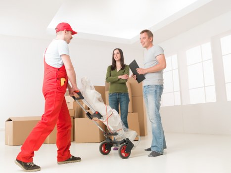 Careful furniture handling during a flat move in Ealing