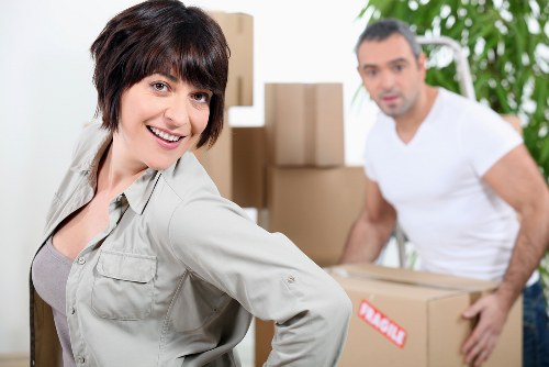 Local movers handling fragile belongings in an Ealing property