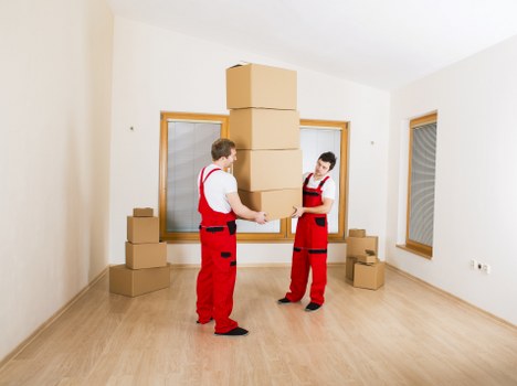 Careful handling of an upright piano during a local move