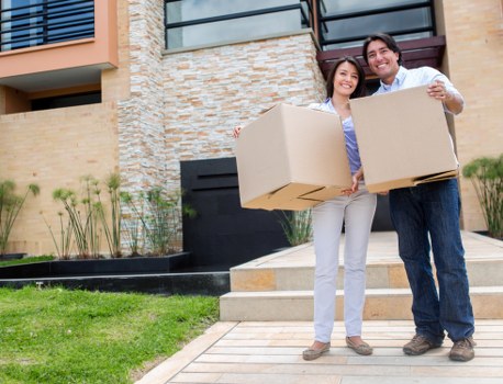 Experienced movers in Ealing transporting furniture with care and coordination
