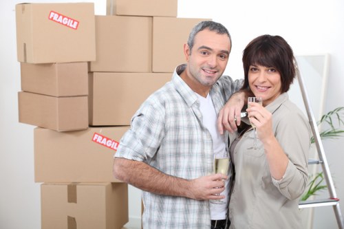 Local removals team handling a flat move in Ealing with safe furniture protection